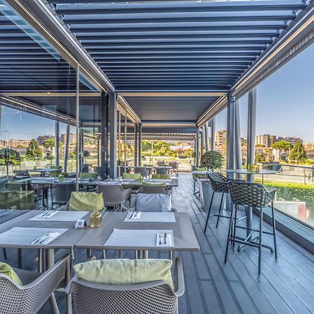 Melia Braga Hotel & Spa Экстерьер фото The restaurant