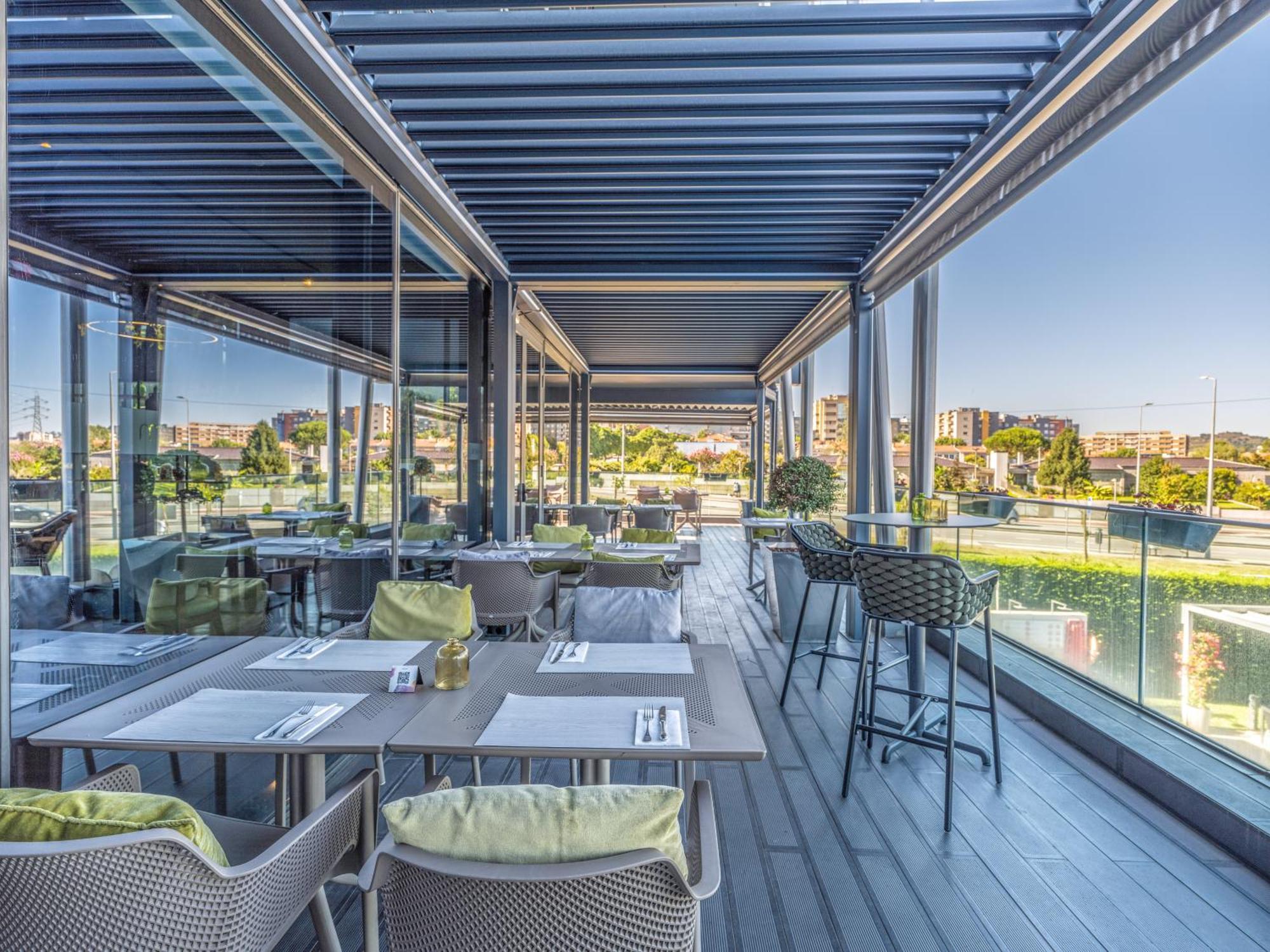 Melia Braga Hotel & Spa Экстерьер фото The restaurant