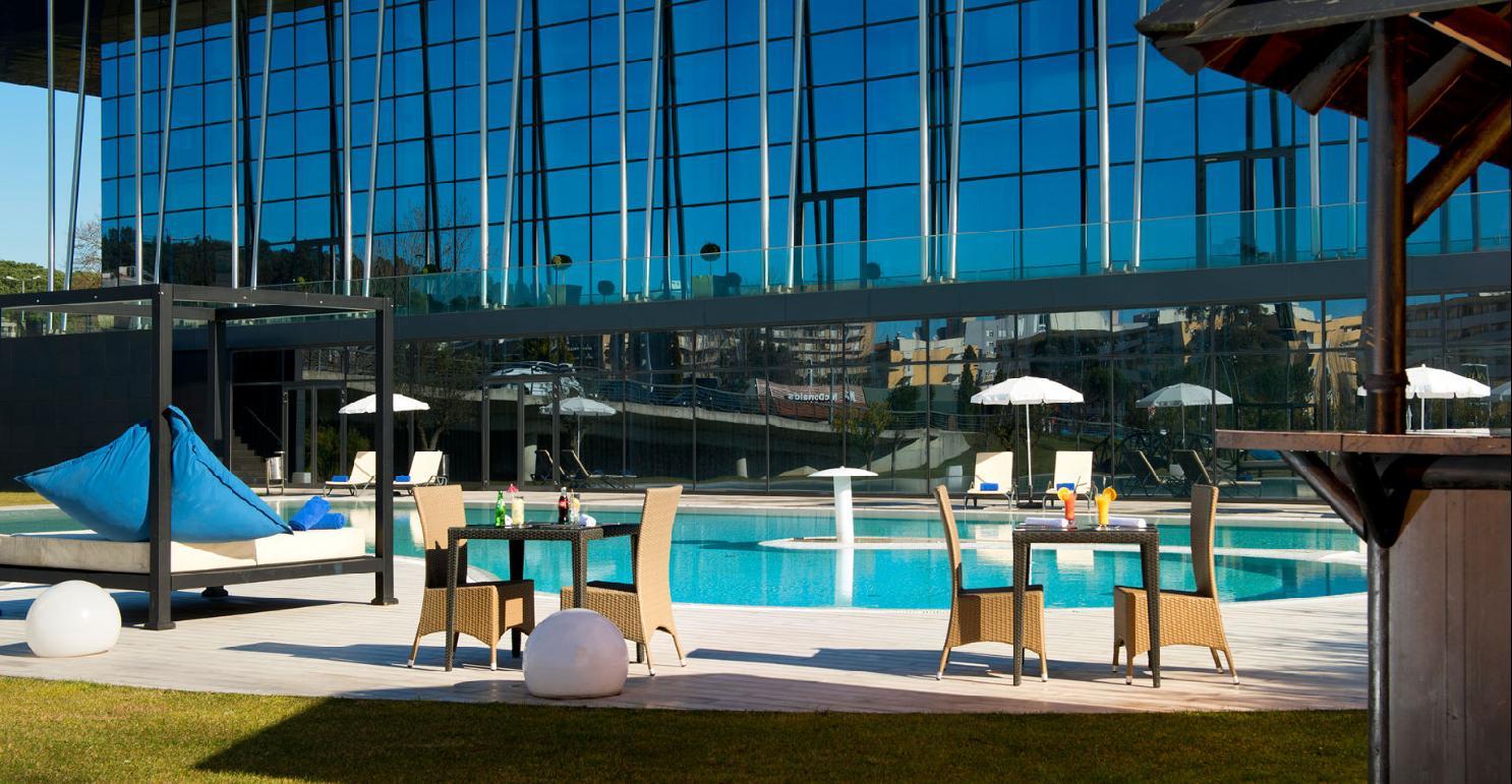Melia Braga Hotel & Spa Экстерьер фото The pool at the hotel